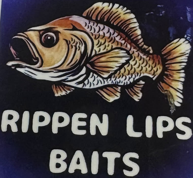 Hand-painted Rippen Lips Baits sign showing a bass with its mouth open